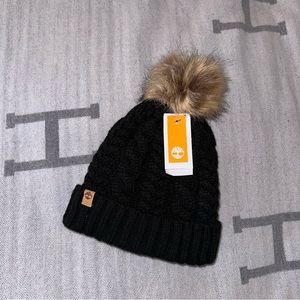 NWT Timberland black with tan faux fur pom knit hat